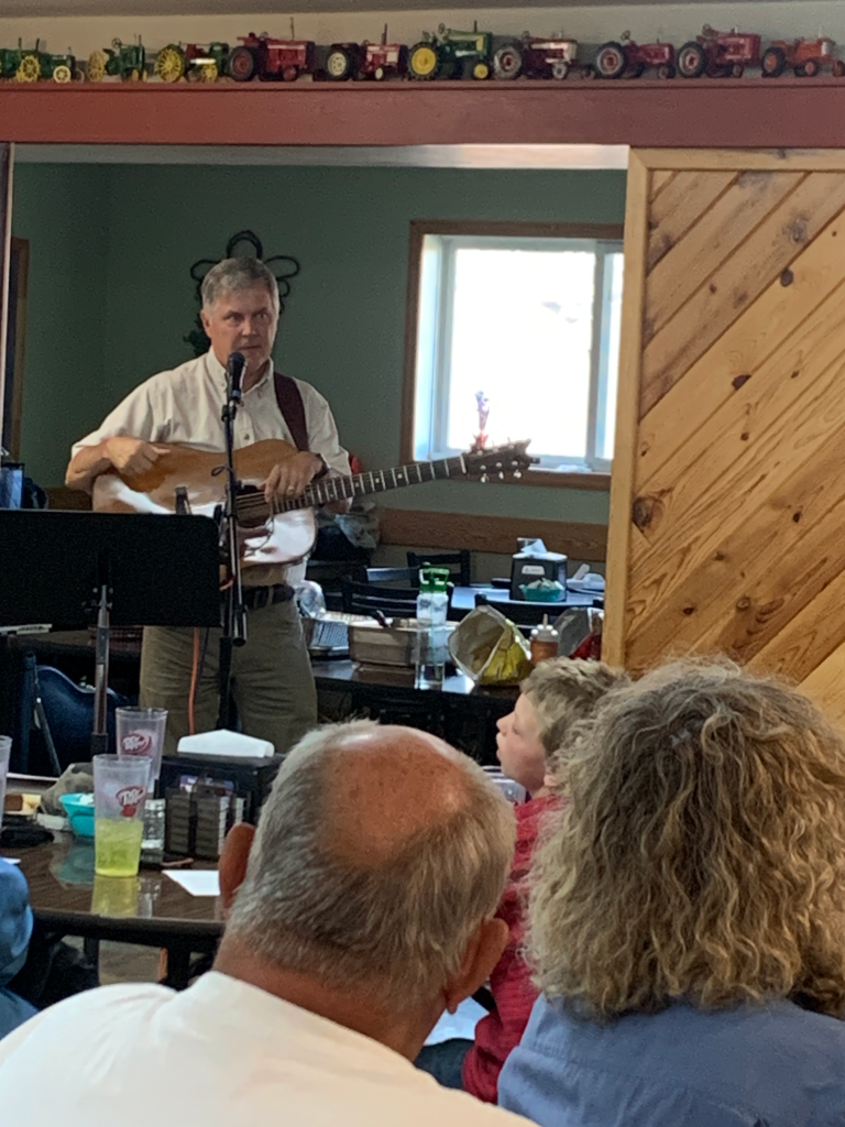 Sharing music and a message at the men's monthly Fellowship dinner at the Grain Bin in Grygla, MN